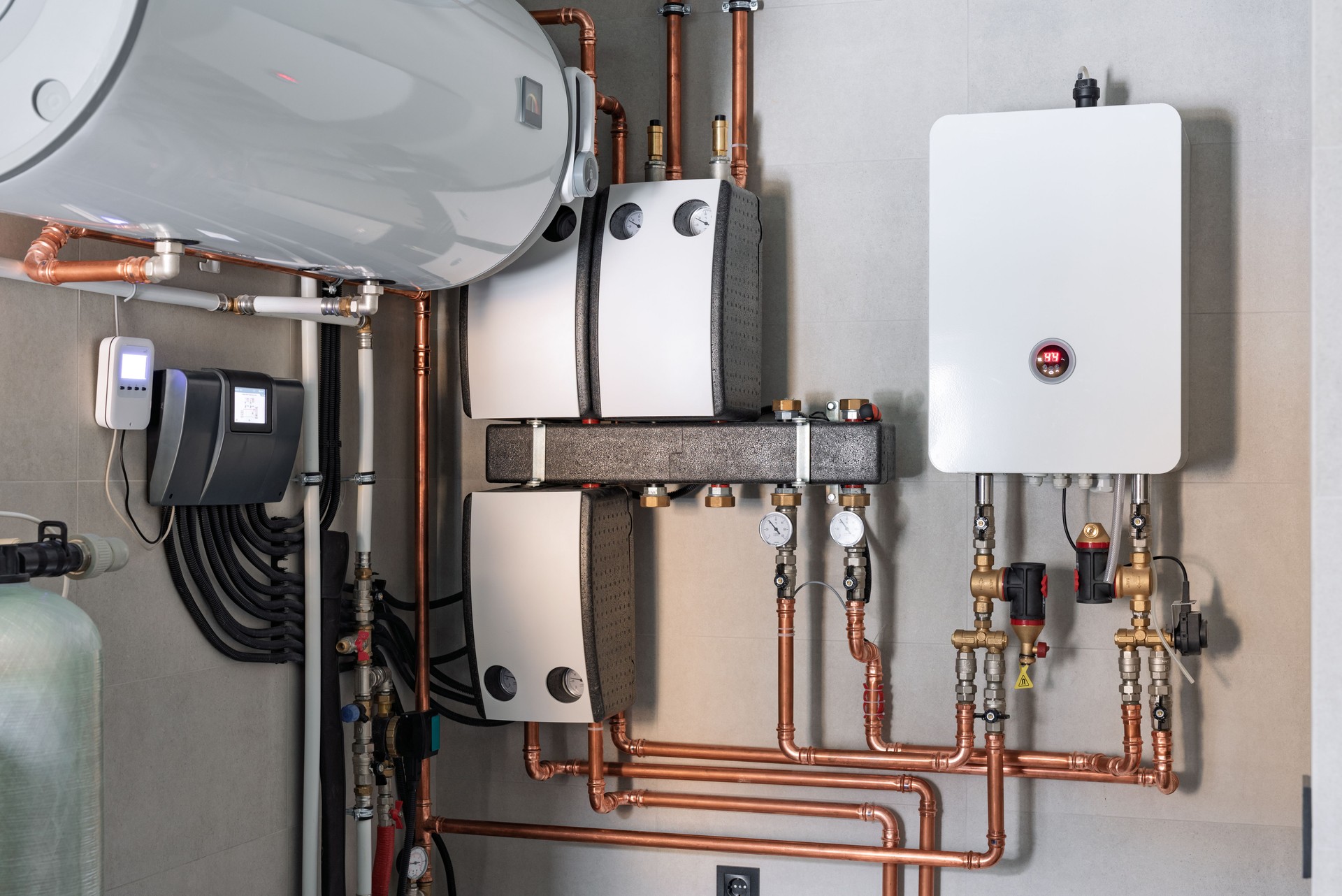 Heating system equipment in a boiler room of modern private house